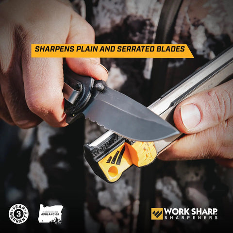 Roam Ready Guided Field Sharpener With Diamond Guides And Adjustable Wrench sharpening a pocket knife blade outdoors.