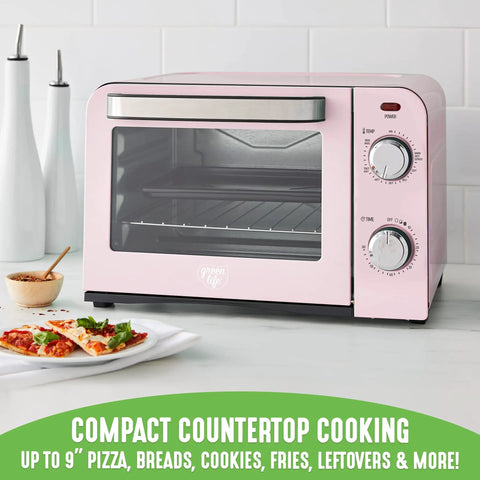 Pink Mini Oven With Healthy Ceramic Nonstick Coating on countertop, aluminized stainless steel rack, chrome pan handle, PFAS Free PFOA Free