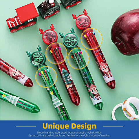Colorful Christmas-themed pens with glitter, surrounded by holiday ornaments and a red apple on a green background.