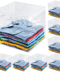 Set Of 15 Clear Cube Storage Bins 14 Inch Square With Zippered Lids Foldable Closet Organizer displayed with folded shirts