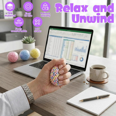Office desk with hand holding stress ball from All In One Squishy Making Kit With Heavy Duty Expander Clamp TPR Skins 15 Cable Ties