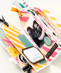 Scrapbook album with colorful tags made using 3-In-1 Round Tag Punch For Crafting And Scrapbooking, Multi Color Tool That Lets You Create Gift Tags, Planner Labels, Album Tags, And DIY Projects Fast With No-Fuss, Clean Rounded Edges.