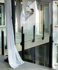 Kickass 304 Stainless Steel Glass Railing Side Support Bracket For Balcony And Patio Deck Posts with smooth install and glass panels.