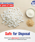 Eco Friendly Off White Plant Based Packing Peanuts Bulk Void Fill Padding For Fragile Moving Supplies Heavy Duty Cushion Material, scattered on wooden surface.