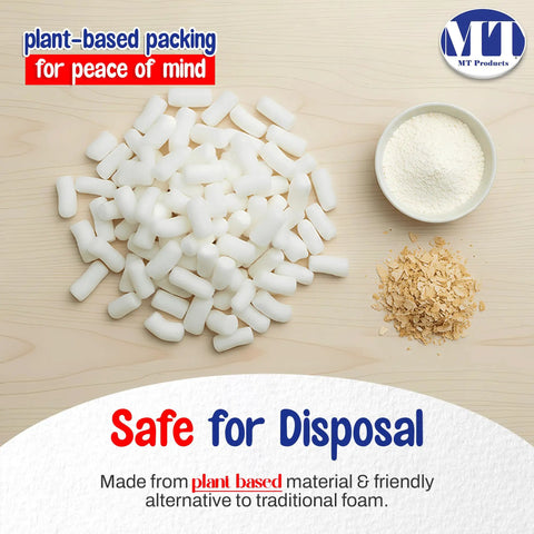 Eco Friendly Off White Plant Based Packing Peanuts Bulk Void Fill Padding For Fragile Moving Supplies Heavy Duty Cushion Material, scattered on wooden surface.