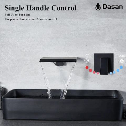 Slick Matte Black Wall Mount Waterfall Bathroom Faucet with Single Handle above a black in-wall sink displaying water flow, modern design.