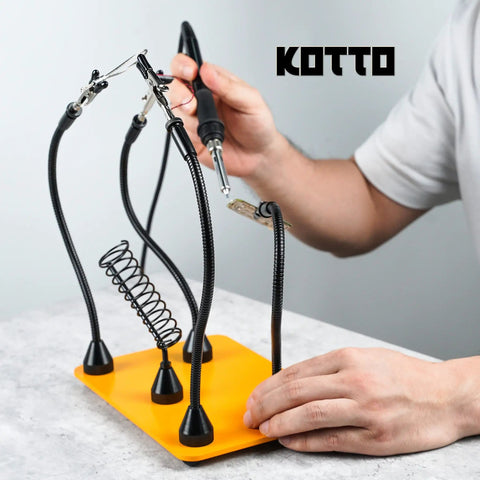 Four Magnetic Gooseneck Helping Hands Soldering Station With PCB Holder And Stainless Steel Crocodile Clamps in use