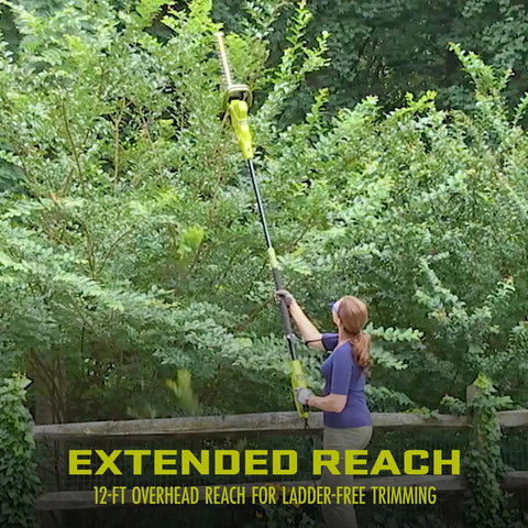 Woman using Multi Angle Telescoping Electric Hedge Trimmer With Convertible Pole To Handheld 19 Inch Blade 4.5 Amp reaching tall hedge