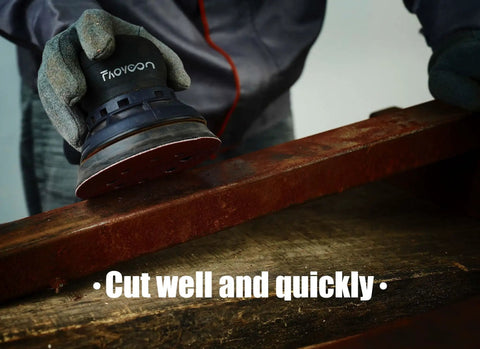 Person using 5 Inch 8 Hole Orbital Sanding Discs Set, 100 Pcs Hook And Loop Sandpaper For Woodworking on a wooden surface