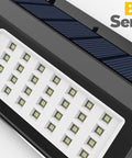 Close-up of 62 LED Solar Wall Lights with Motion Sensor Outdoor Security Lighting showing LED array and sensor ball head.