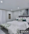 Dope Vibrant LED Recessed Can Lights 6 Inch Retrofit Downlight 5000K illuminating modern bedroom with art and decor