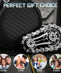 Sprocket Fidget Bike Chain Hand Roller For Anxiety Relief And Sensory Fun with gift packaging next to metal roller.