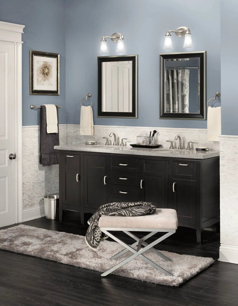 Eva 2 Light Dual Mount Bath Vanity Fixture With Frosted Glass In Brushed Nickel Finish installed above double mirrors