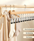 Slick Vertical Closet Organizer With Ten Heavy Duty Pant Clips For No Fuss Dorm And Apartment Storage, featuring secured clips and socks.