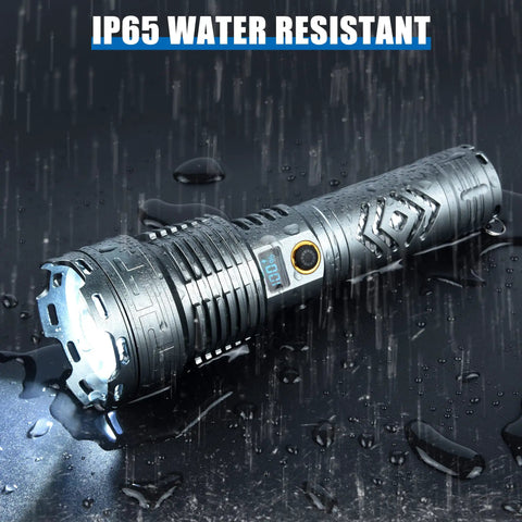 Beastly Bright 200000 Lumen Rechargeable LED Flashlight With LCD Display in rain demonstrating IP65 water resistance