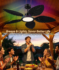 RGB Tropical Outdoor Palm Leaf Ceiling Fans with Light,52” Black Flush Mount in a patio gathering with friends.