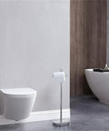 Reserve Function Free Standing Toilet Paper Holder With Crystal Finial In Chrome Finish next to white toilet in modern bathroom