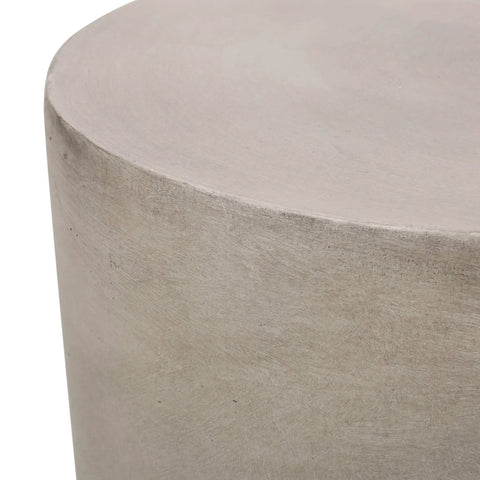 Top view of light gray cylindrical outdoor side table in lightweight concrete, showcasing smooth finish for patio and backyard.