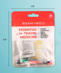 Roam+Well Essential Travel Medicine Kit front view; red/white pouch with 18 tablets, TSA-approved, Business