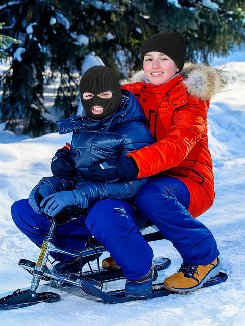 Child wearing Three Hole Full Face Balaclava Gaiter For Outdoor Sports And Cycling Knit Ski Mask, with sibling in snow, black medium.
