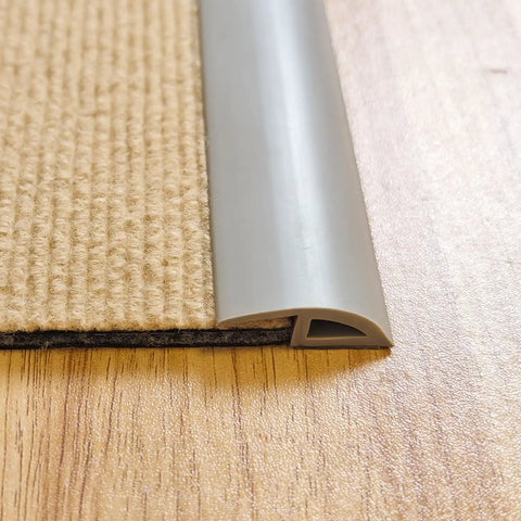 Side view of 6.6 Ft Long Floor Transition Strip Edge Reducer For Rubber Wood Tile And Carpet Floors Beveled Ramp Threshold Edging Vinyl Trim