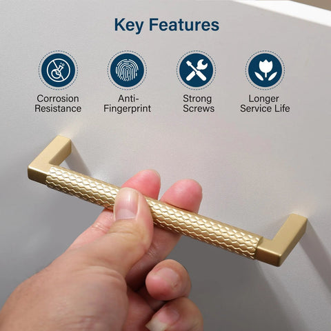 Close-up of hand holding 10 Pack Solid Zinc Alloy 5 Inch Center To Center Slim Square Bar Cabinet And Drawer Handles Gold Knurled Dresser Pulls