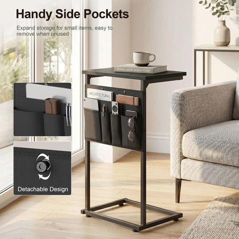 C Shaped End Table With Sliding Tray Under Sofa 28 Inch High Side Table With Storage Bag Black next to a gray sofa in a living room