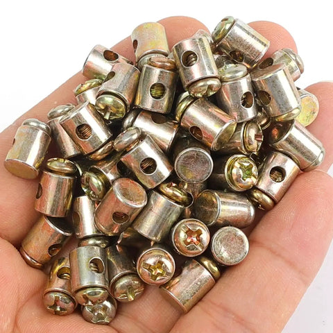 Hand holding Twenty Pack Universal Throttle Cable Ends With Screws End Caps For Motorcycle Scooter Dirt Bike And Bicycle Fits Up To Three Millimeter Wires