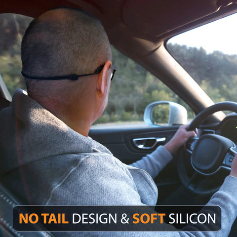 Driver wearing glasses with Glasses Strap Holder No Tail With Length Adjusters for wide and narrow temples, in a car.