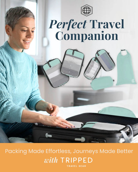Woman packing suitcase with Compression Packing Cubes For Travel 6-Piece Premium Set With Laundry And Shoe Bag, Dusty Teal Mesh.