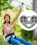 Double Zip Line Pulley Trolley With Tandem Dual Speed Pulleys 30kN 6700LBS Break Strength in a zip line setting with a person riding.