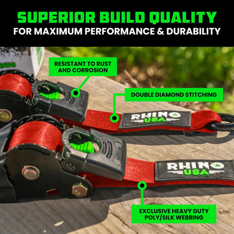 Kickass Retractable Ratchet Straps 2-Pack Cam Lock Tie Down 2 In X 10 Ft 3300 Lb on a wooden surface highlighting build quality.