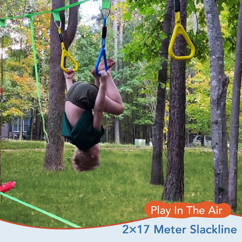 Child swinging upside down on Two In One Ninja Warrior Obstacle Course With Zip Line For Kids And Adults Transformable Backyard Slackline Kit