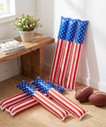120 Pcs Inflatable Thunder Sticks for Parties and Games Red White and Blue USA Flag Boom Sticks next to footballs indoors