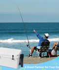 Beach scene with two people fishing, featuring a Wall Mounted Cooler Fishing Rod Holder For YETI And RTIC on a white cooler.