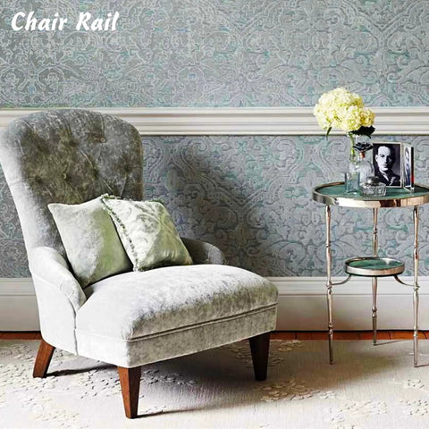 Luxury chair and table with Peel And Stick Baseboard Trim With Self Adhesive Chair Rail Molding Made From Hardened Rubber visible on wall.