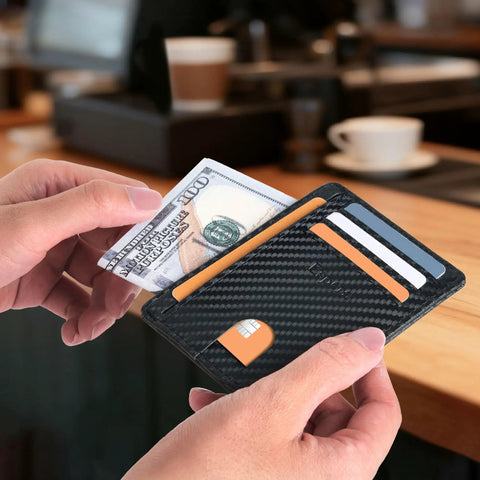 Ultra Slim Front Pocket Wallet For Men, RFID Blocking Credit Card Holder showing carbon fiber design with cards and cash