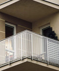 Kid Safe Banister Guard Net For Baby And Pets 15ft Long 3ft High Rail Balcony Stair Mesh installed on outdoor balcony railing.