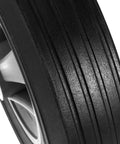 Close-up of Solid Rubber 10 Inch Hand Truck Wheel With Five Eighth Inch Ball Bearing, tread pattern detail, heavy duty airless design
