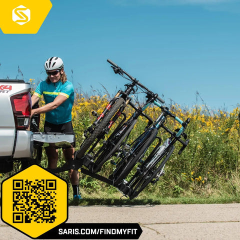 Heavy Duty 4 Bike Hitch Rack For 2 Inch Receiver, 190 Lb Total Weight, Tilt Down With Foot Pedal attached to truck, holding bikes