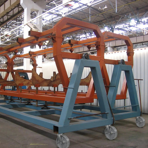 Kingpinless Casters Badass Heavy Duty Workhorse Built Different Deliver Two Thousand Five Hundred Pounds Per Wheel zero play handling precision rollers on industrial platform frame.
