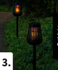 Solar Insect Killer Torch Bug Zapper And Accent Light For Patio Outdoor Pest Control That Kills Bugs On Contact With Flickering Flame LED eco-friendly design in garden path