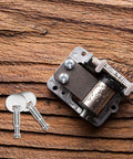 Music Box Winding Key Replacement Round Handle 1.57 Inch For Standard Movements with two keys on wooden background