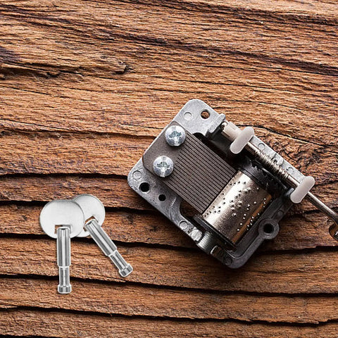 Music Box Winding Key Replacement Round Handle 1.57 Inch For Standard Movements with two keys on wooden background