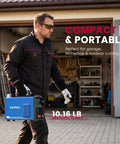 Man carrying Dual Voltage 110 to 220V 50A Plasma Cutter for DIY and Workshop with compact and portable design into garage