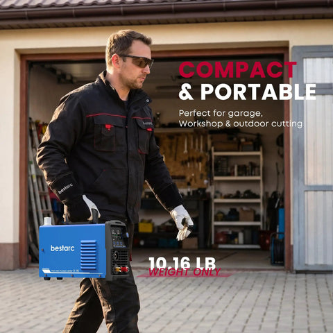 Man carrying Dual Voltage 110 to 220V 50A Plasma Cutter for DIY and Workshop with compact and portable design into garage