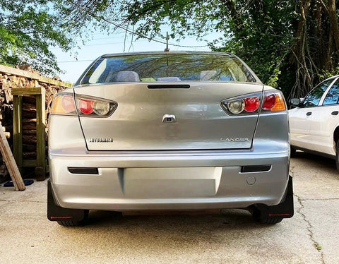 Rear view of a Mitsubishi Lancer Evolution X sedan with Dark Smoked Lens Full LED Trunk Lid Center Mount Third Brake Light Bar Assembly