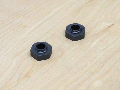 Heavy Duty Solar Bulkhead Connector Pair MC4 30A 1000V IP67 Black Waterproof Built For Tough Panels And Cables Includes Male And Female Bulkhead Connectors Bundle on a wood background