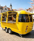 Top Tier Stainless Steel Food Trailer A Solid 16 Foot Yellow Mobile Kitchen Built Tough And Dot Certified For Street Ready Operators Running A Smooth Hustle With Zero Headache Logistics, showcasing rear and side views.