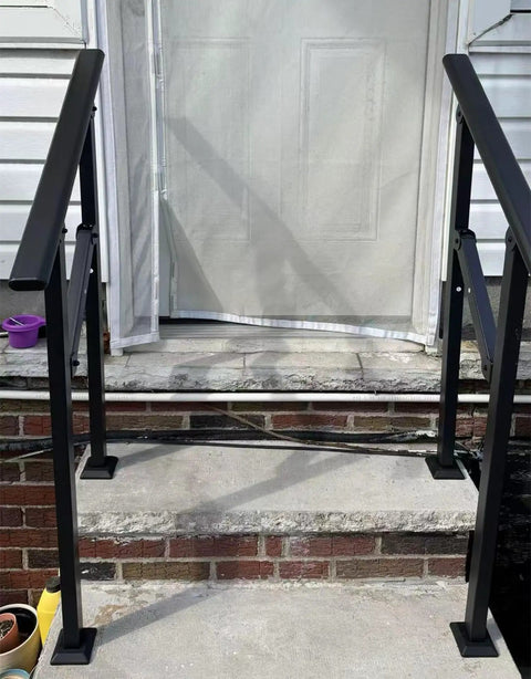 Heavy Duty Two Pack Galvanized Steel Handrails For Outdoor Steps Rust Resistant Black Round Safety Rails For Decks Patios, installed at concrete steps.